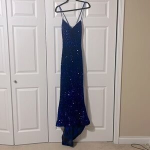 A navy blue prom dress. This is a size 2 from the store MDM.